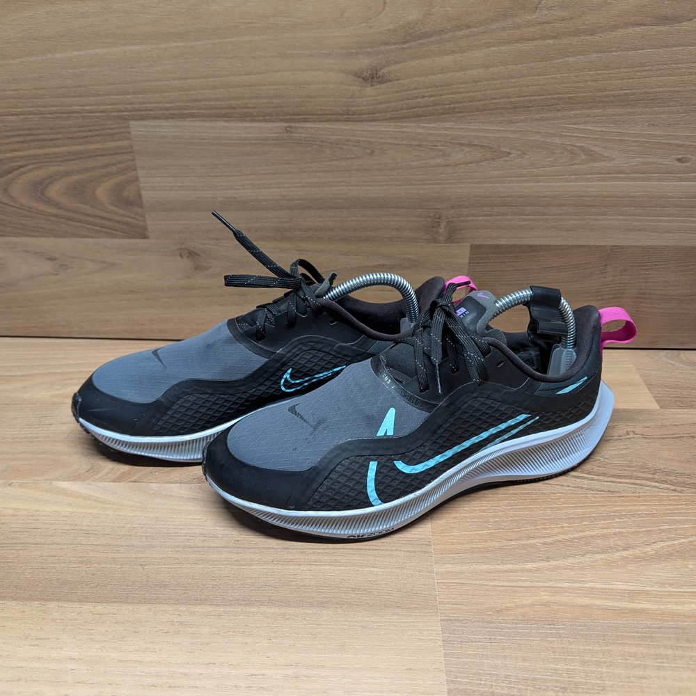 Gray and Black Sneakers with Teal Accents